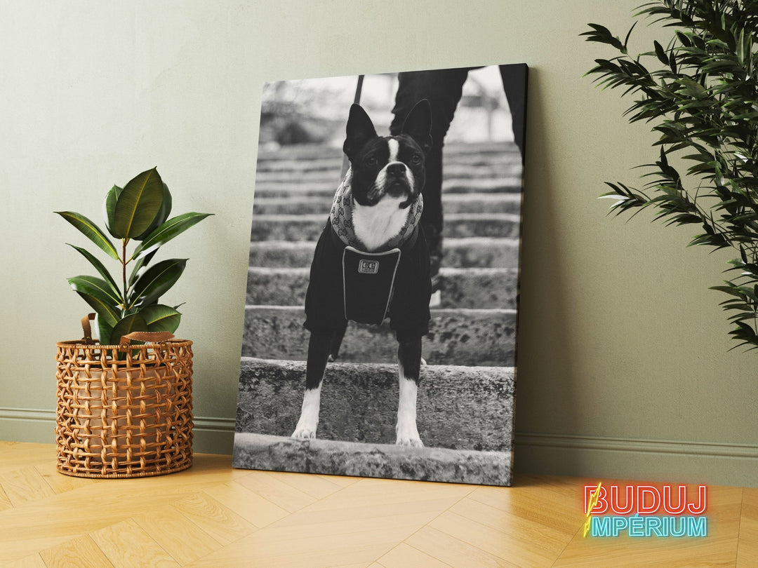 Motivational canvas wall art with a black and white bulldog on stairs leading to a modern office.