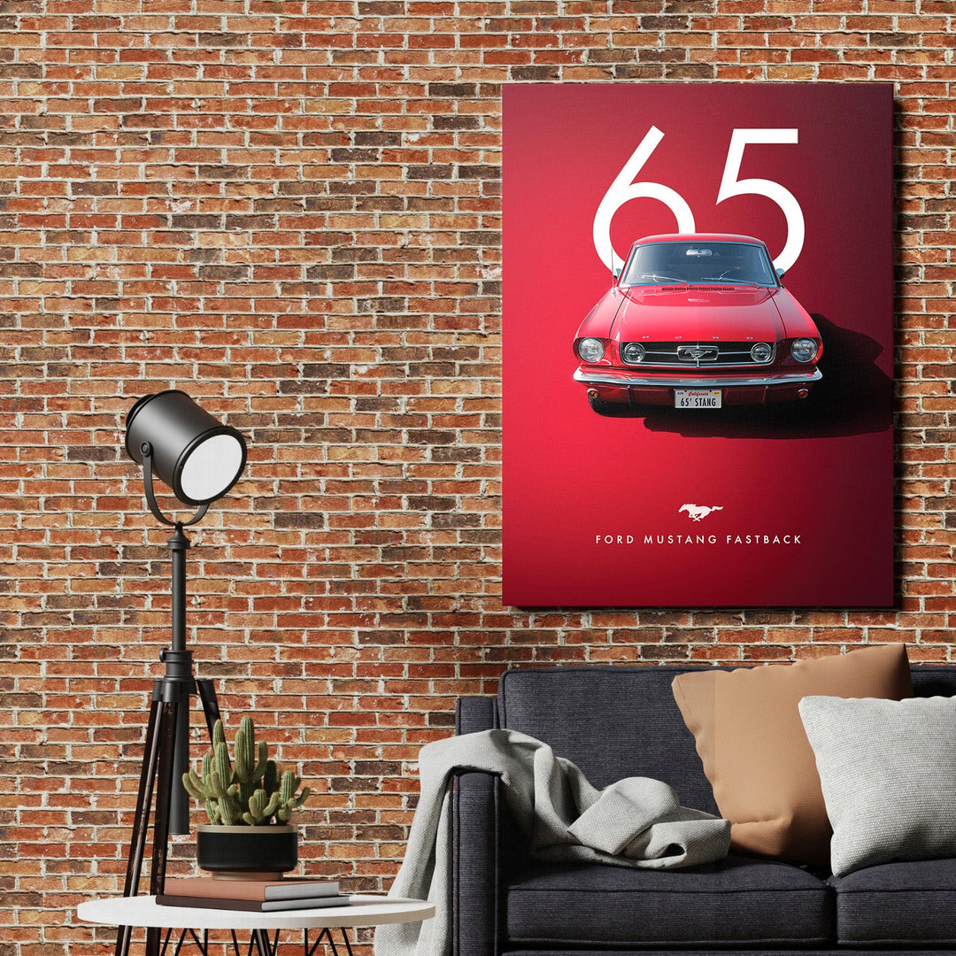 Motivational canvas wall art with a red 1965 Ford Mustang on a brick wall in an industrial living room
