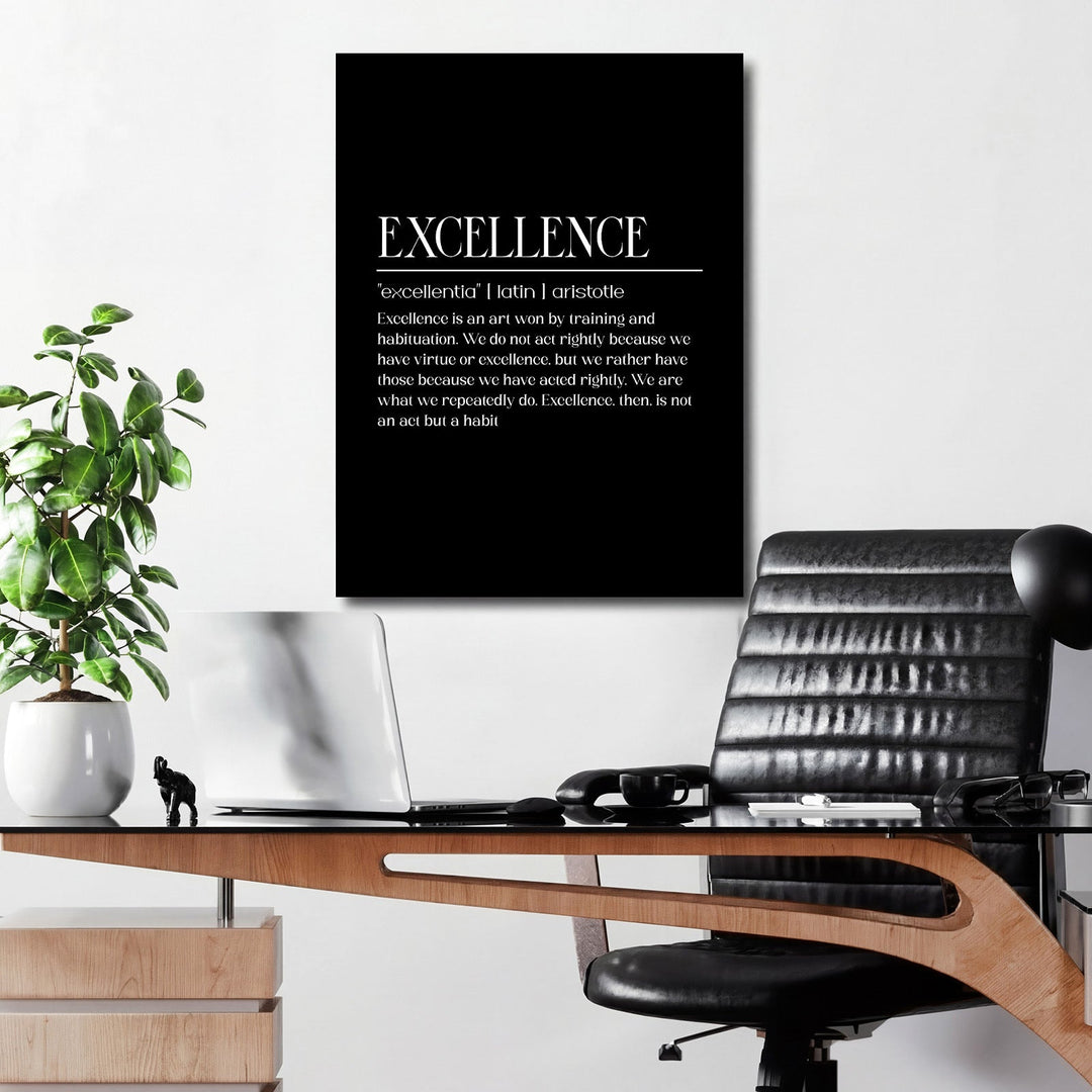 Motivational wall art with a white Aristotle quote on a black canvas in a modern office