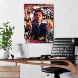 Motivational wall art in an office with a collage of money, a sports car, a bull and a luxury watch