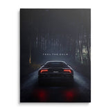 Luxury canvas print with the night silhouette of a Lamborghini Huracan on a forest road, front view