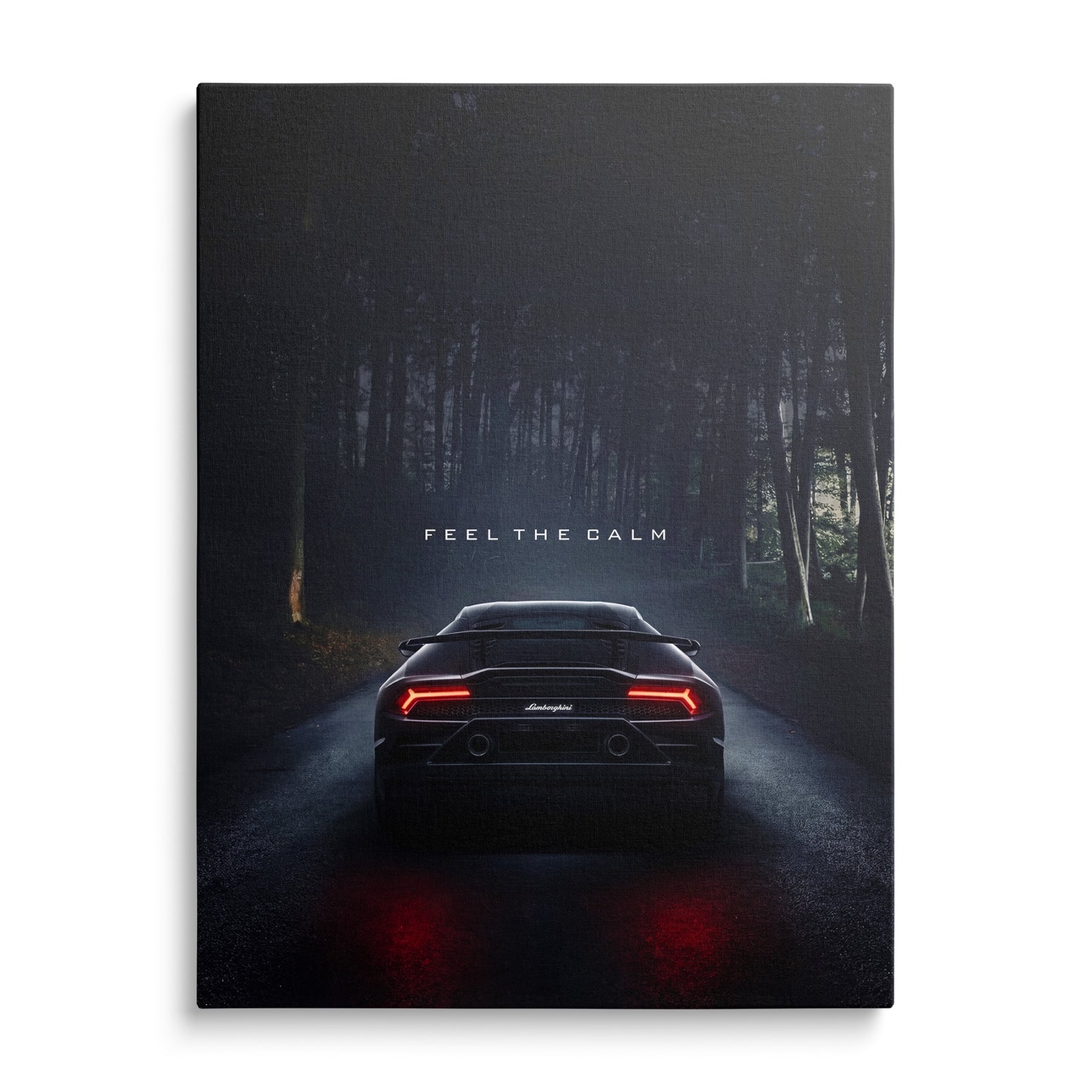 Luxury canvas print with the night silhouette of a Lamborghini Huracan on a forest road, front view