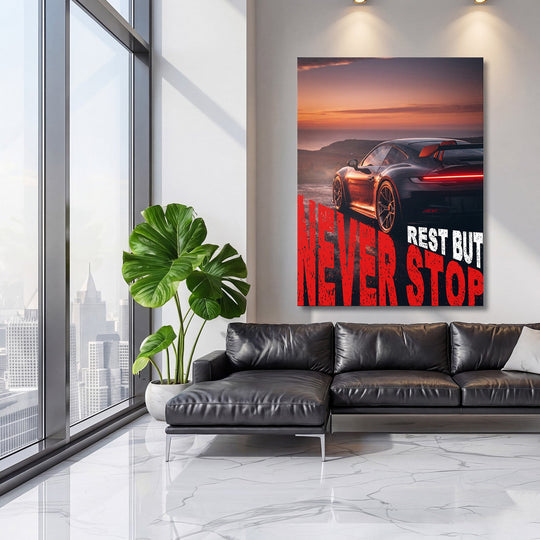 Motivational canvas print with a luxury sports car at sunset in a living room