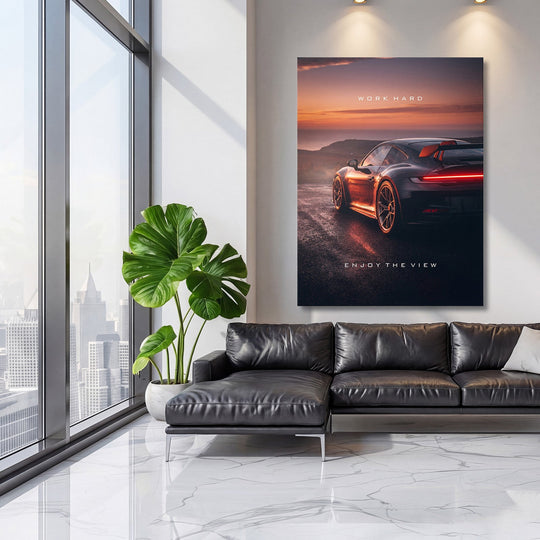 Motivational wall art with sports supercar at sunset in a modern living room