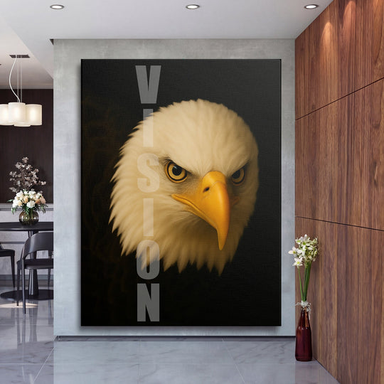 Luxury canvas wall art with an eagle and vertical VISION text in a modern minimalist interior.