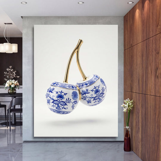 Luxury canvas print with blue-and-white porcelain cherries and gold stems in a modern interior
