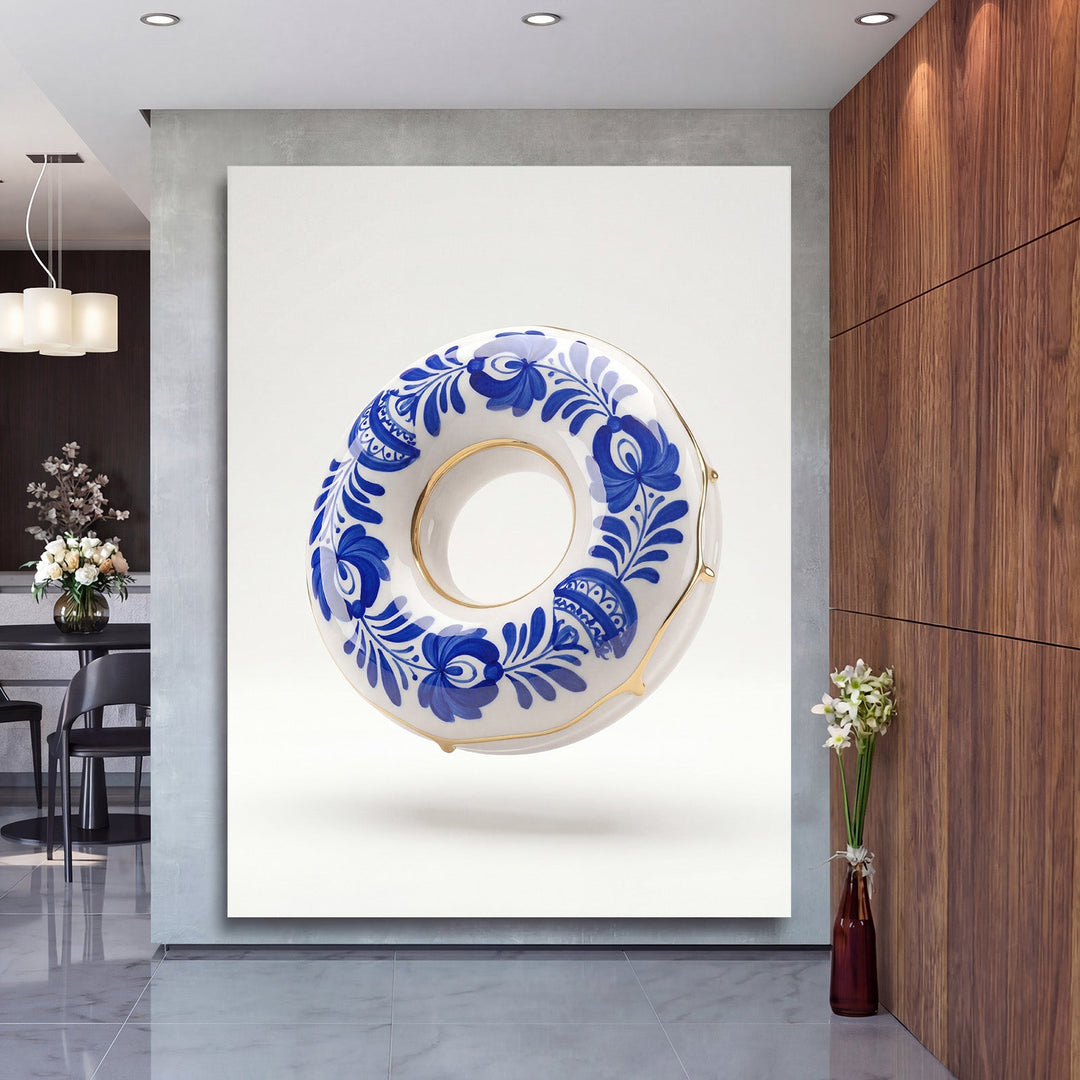 Motivational wall art with a blue-and-white porcelain donut and gold accents in a living room