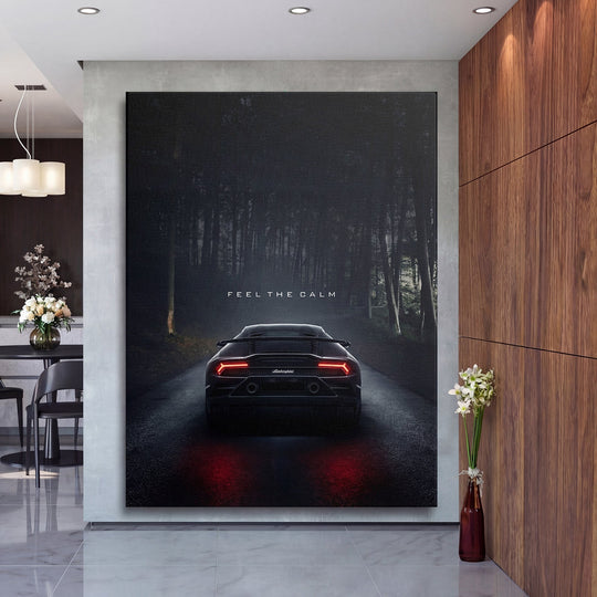 Luxury canvas print with a black Lamborghini from the rear in a night forest and the motivational quote “Feel the Calm”