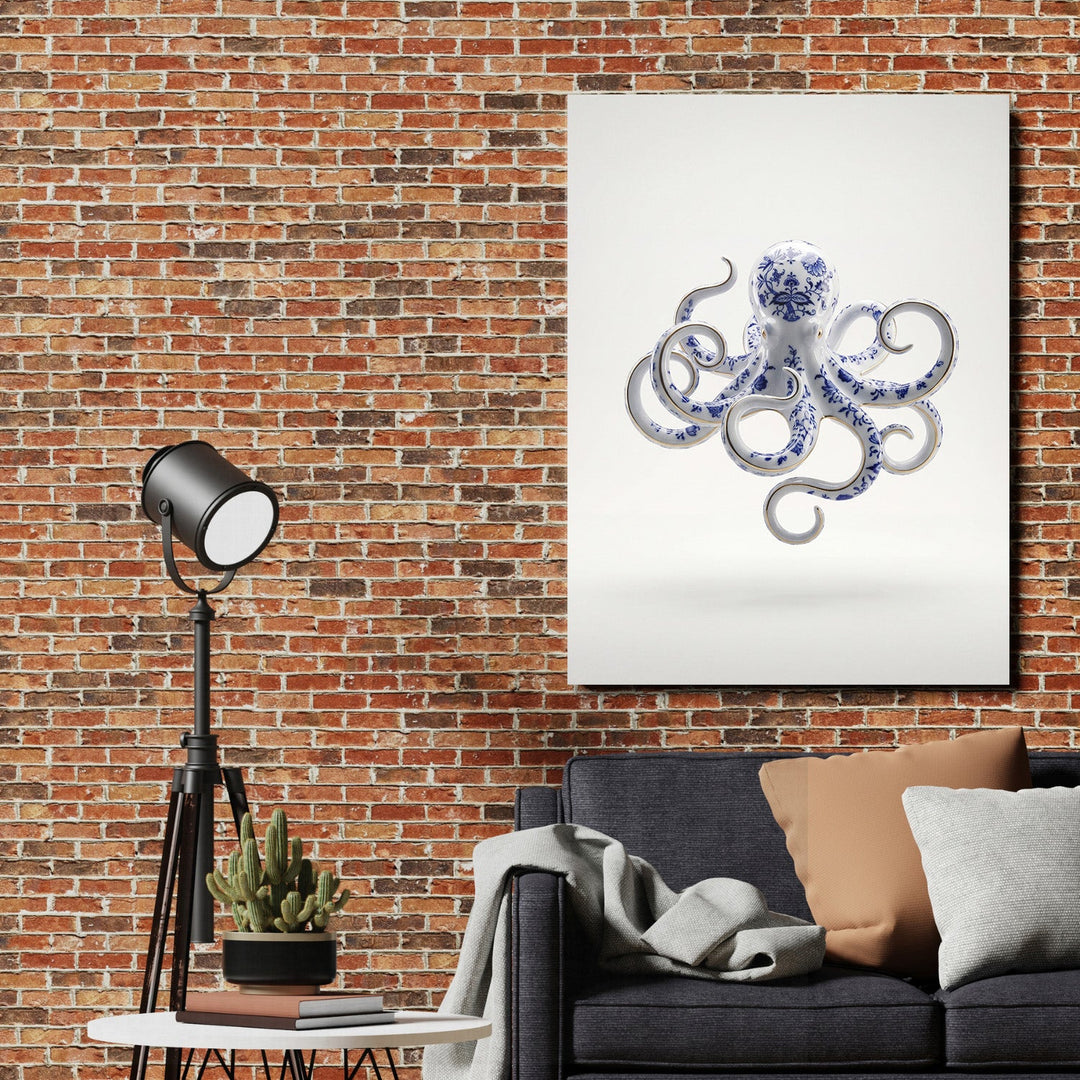 Motivational canvas print with a blue-and-white porcelain octopus hanging on a brick wall in a loft interior