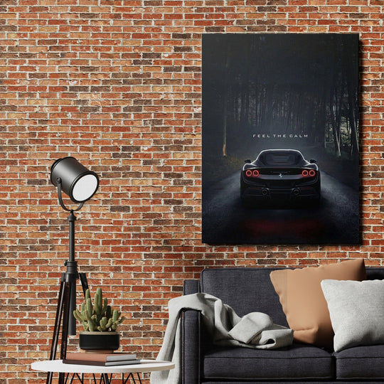 Motivational canvas wall art with black sports car by lesa and text FEEL THE CALM in a living room