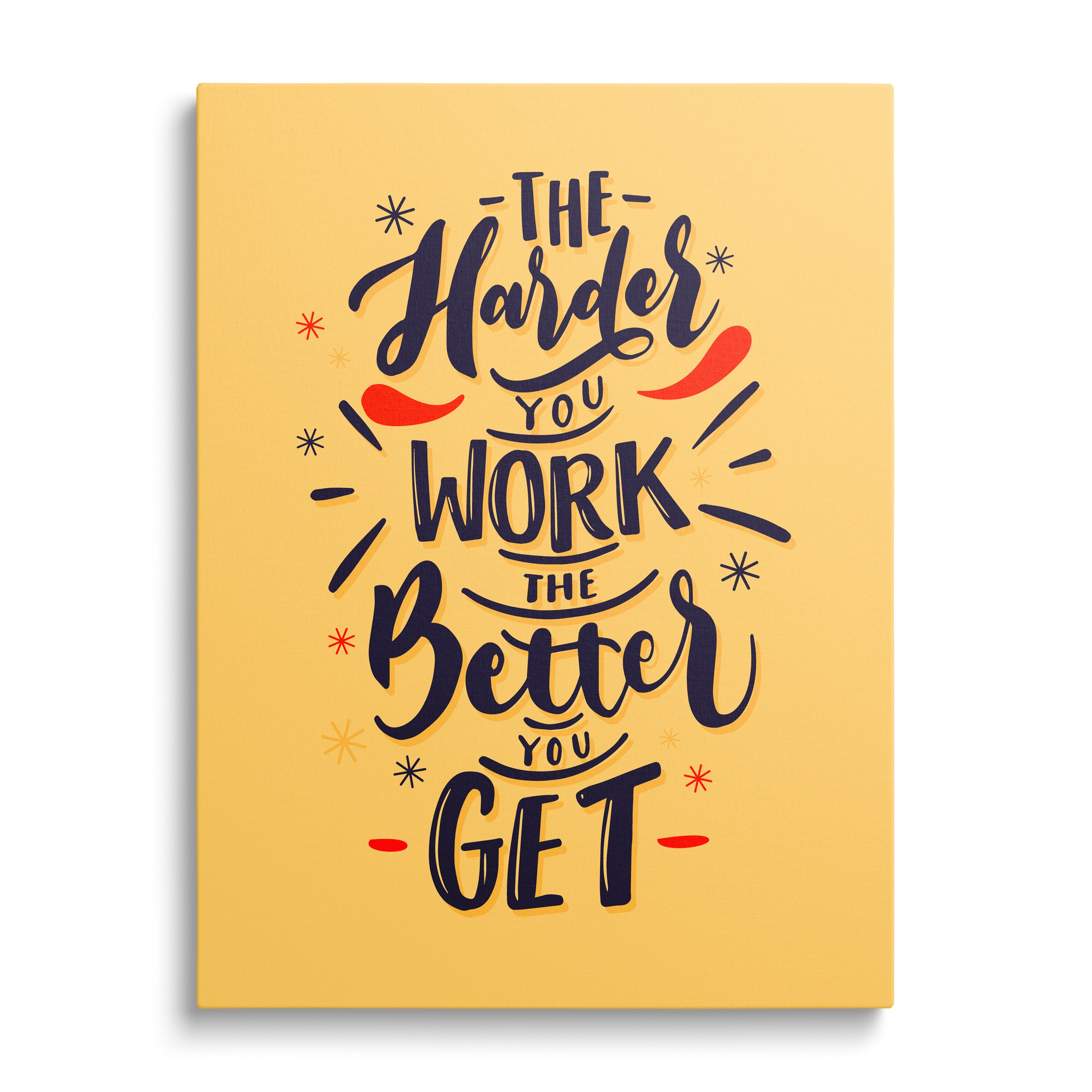 Motivational canvas print with the quote “The harder you work the better you get” on a yellow background, front view