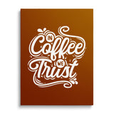 Motivational canvas print with the white phrase “In Coffee We Trust” on a brown minimalist background