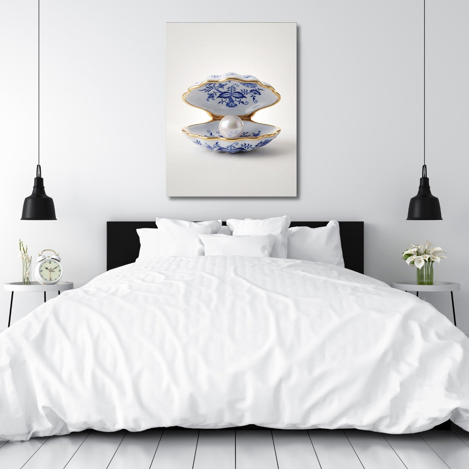 Modern canvas print with a pearl shell above a bed in a white bedroom, minimalist interior