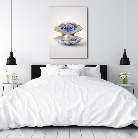 Modern canvas print with a pearl shell above a bed in a white bedroom, minimalist interior