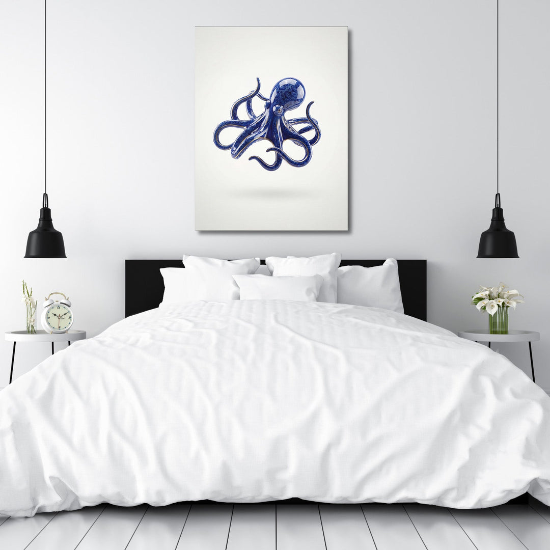 Modern canvas print with a stylized blue octopus above a double bed in a bedroom