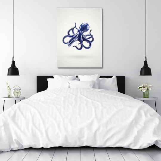 Modern canvas print with a stylized blue octopus above a double bed in a bedroom