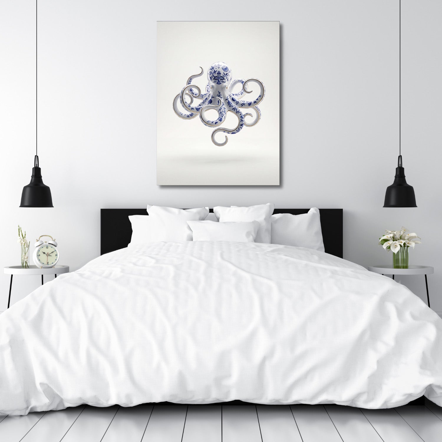 Modern canvas print with a blue-and-white porcelain octopus above a bed in a minimalist bedroom