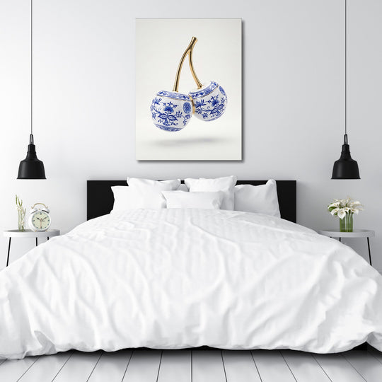 Motivational canvas print with porcelain cherries in a blue-and-white pattern and gold stem for a bedroom