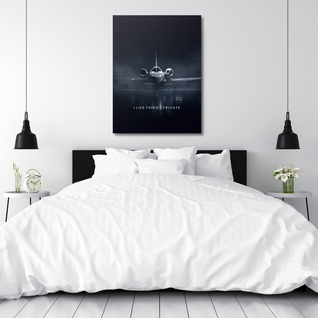Luxury canvas print with a private jet and the quote “I Like Things Private” in a modern bedroom