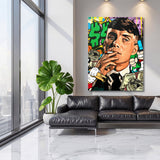 Pop art canvas print in a living room with a portrait of a man smoking a cigarette and a graffiti motif of dollar bills
