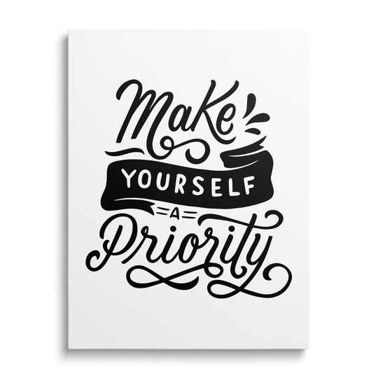 Modern motivational canvas print with the black-and-white quote “Make yourself a priority”, front view