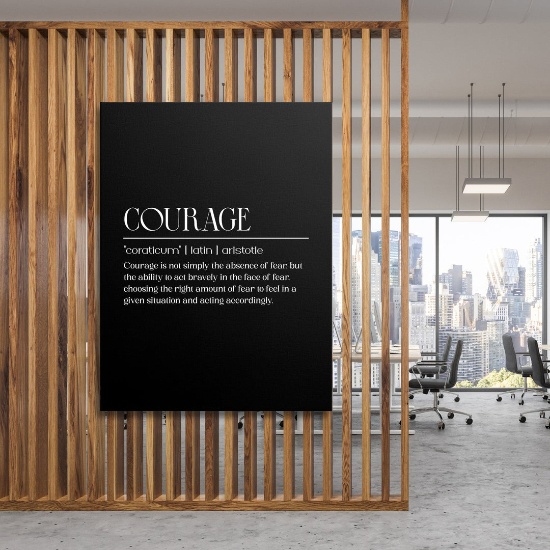 Lifestyle shot of motivational canvas wall art with a courage quote in a modern office behind a wooden partition