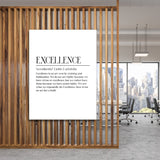 Excellence motivational canvas wall art with a black and white quote and city scene, hanging on a wooden office partition