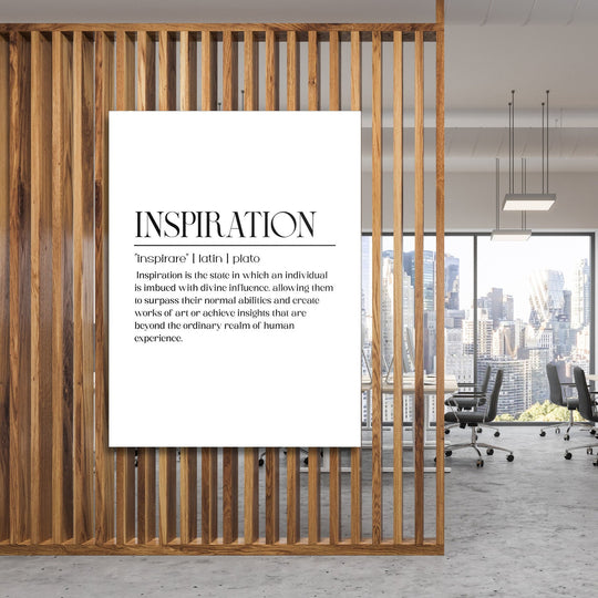 Motivational canvas wall art with a minimalist quote in a modern office behind wooden slats