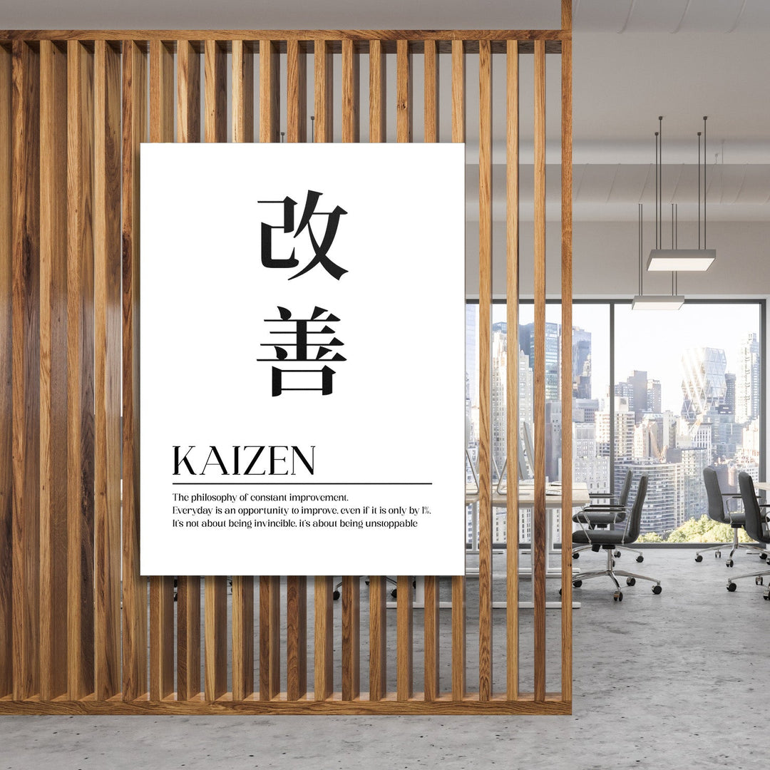 Kaizen motivational canvas print with Japanese kanji, hanging on a wooden slat wall in a modern office