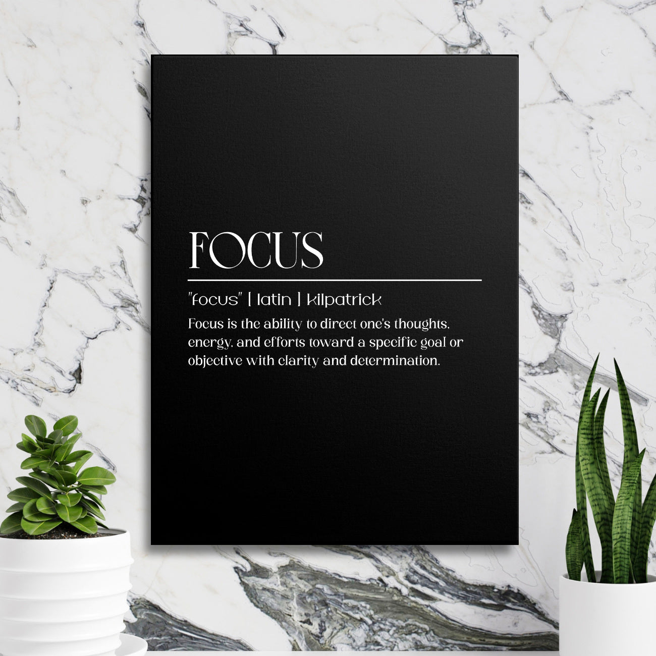 Focus motivational wall art with a black minimalist canvas and white typography in front of a marble wall