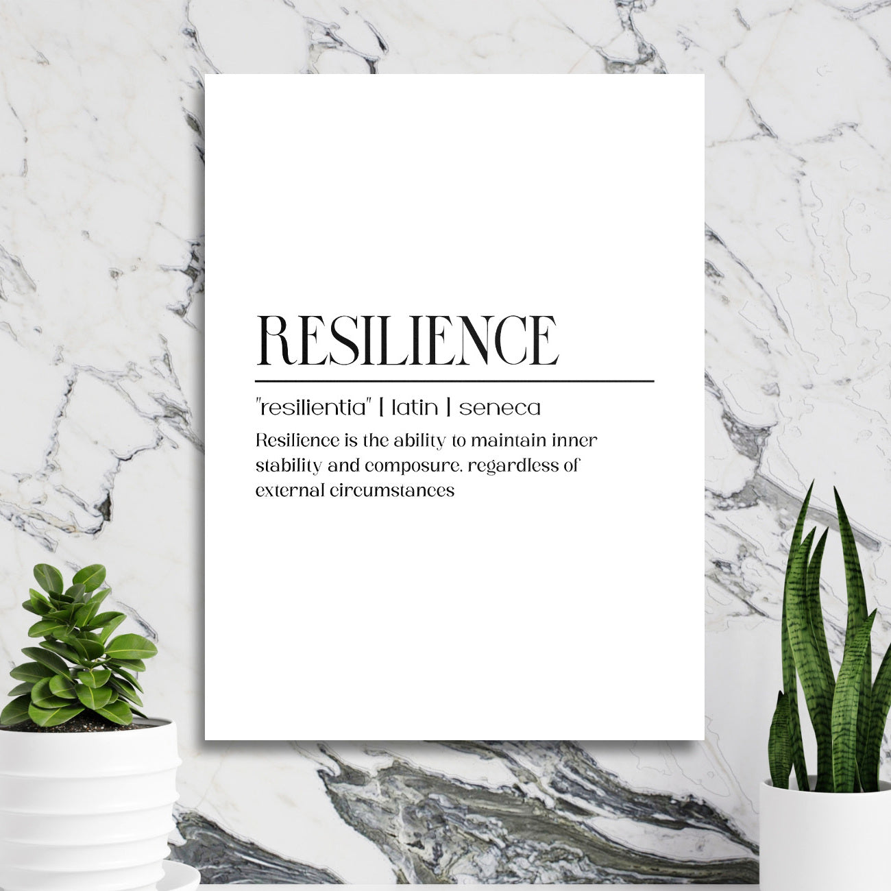 Motivational wall art with a RESILIENCE quote in a minimalist design on a marble wall with plants