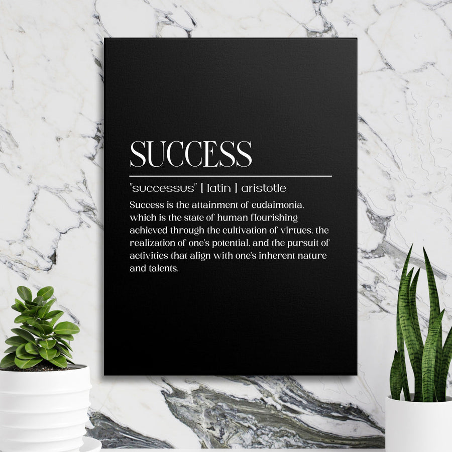 Motivational canvas print with a white Aristotle quote on a black background, marble wall and green plants