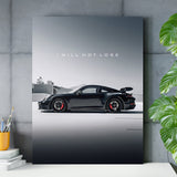 Motivational wall art with black sports car and quote "I WILL NOT LOSE" in a modern office