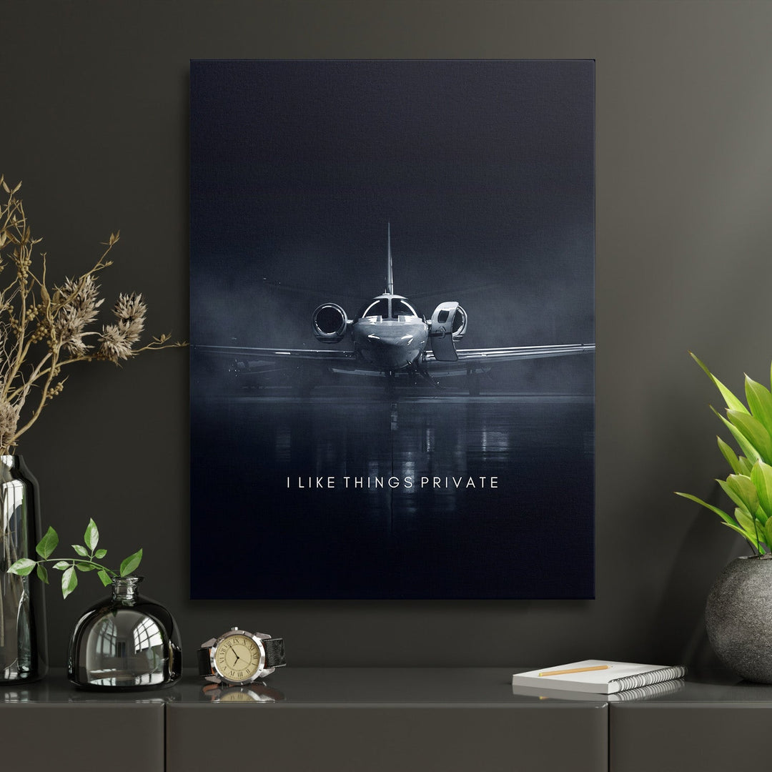 Luxury motivational canvas print for an office, front view of a private jet with a motivational quote
