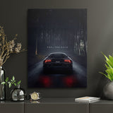 Motivational canvas print with a luxury sports car on a forest road and the quote “Feel the Calm”