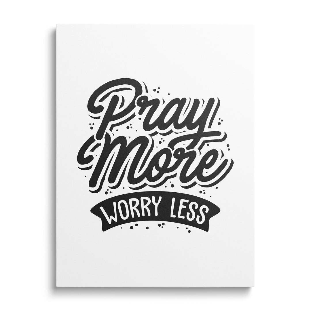 Motivational canvas print with the black-and-white phrase “Pray More Worry Less” in a minimalist design