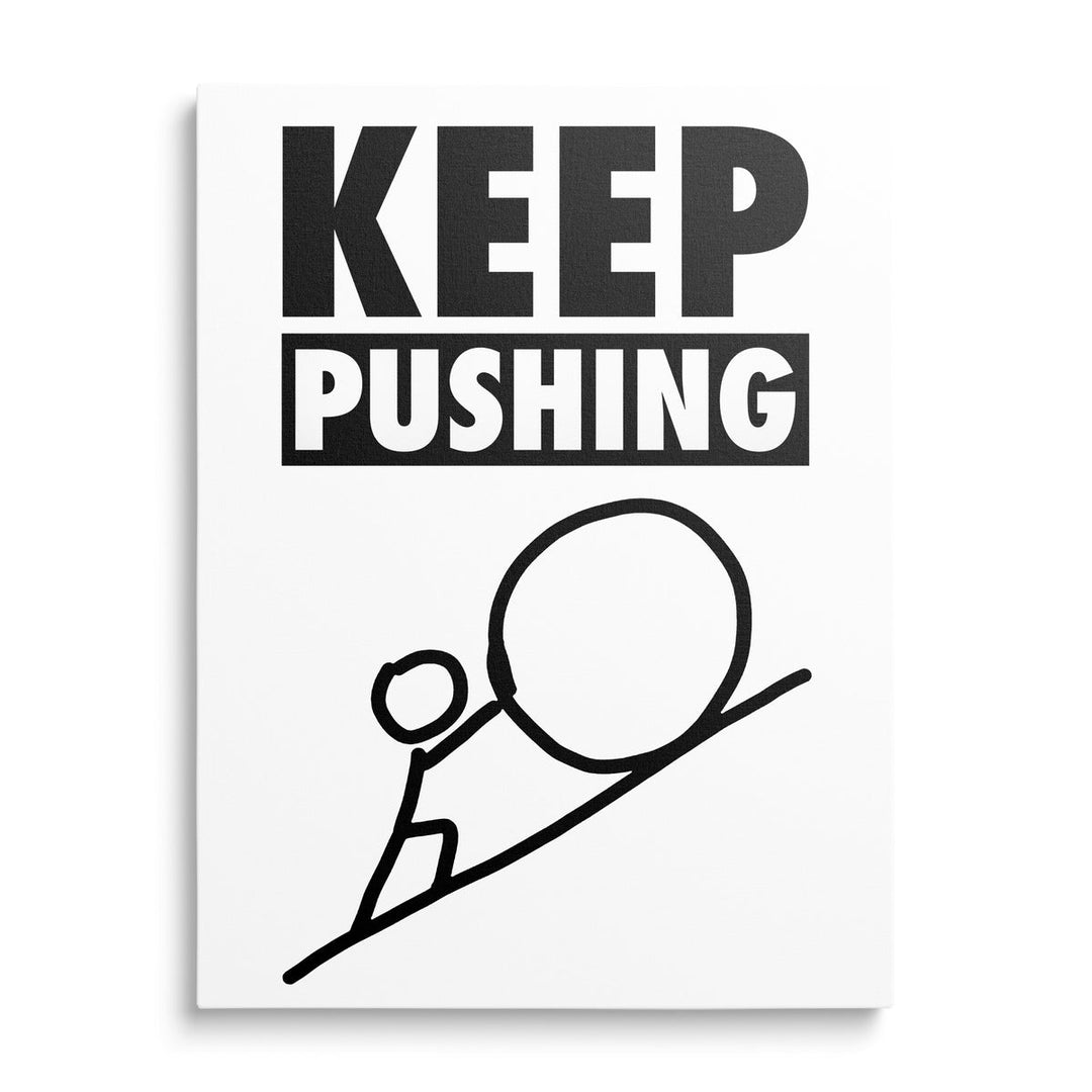 Black and white KEEP PUSHING motivational canvas print with a silhouette of a figure pushing a large stone