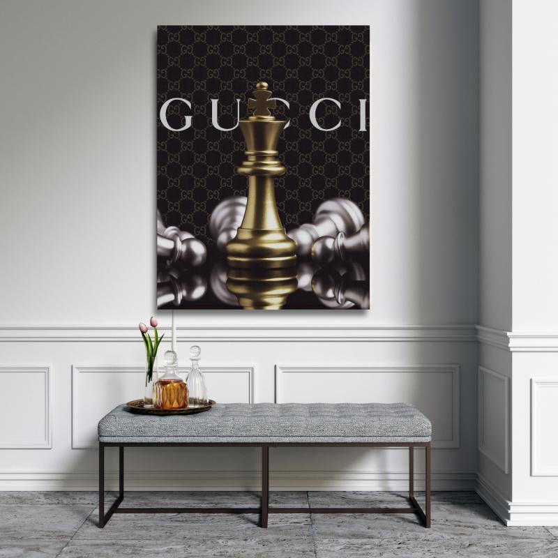 Luxury wall art with a golden chess king and Gucci-style patterned background in an elegant interior.