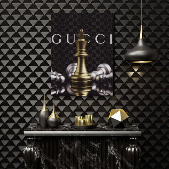 Luxury canvas wall art with a golden chess queen and defeated pieces in a black and gold interior.