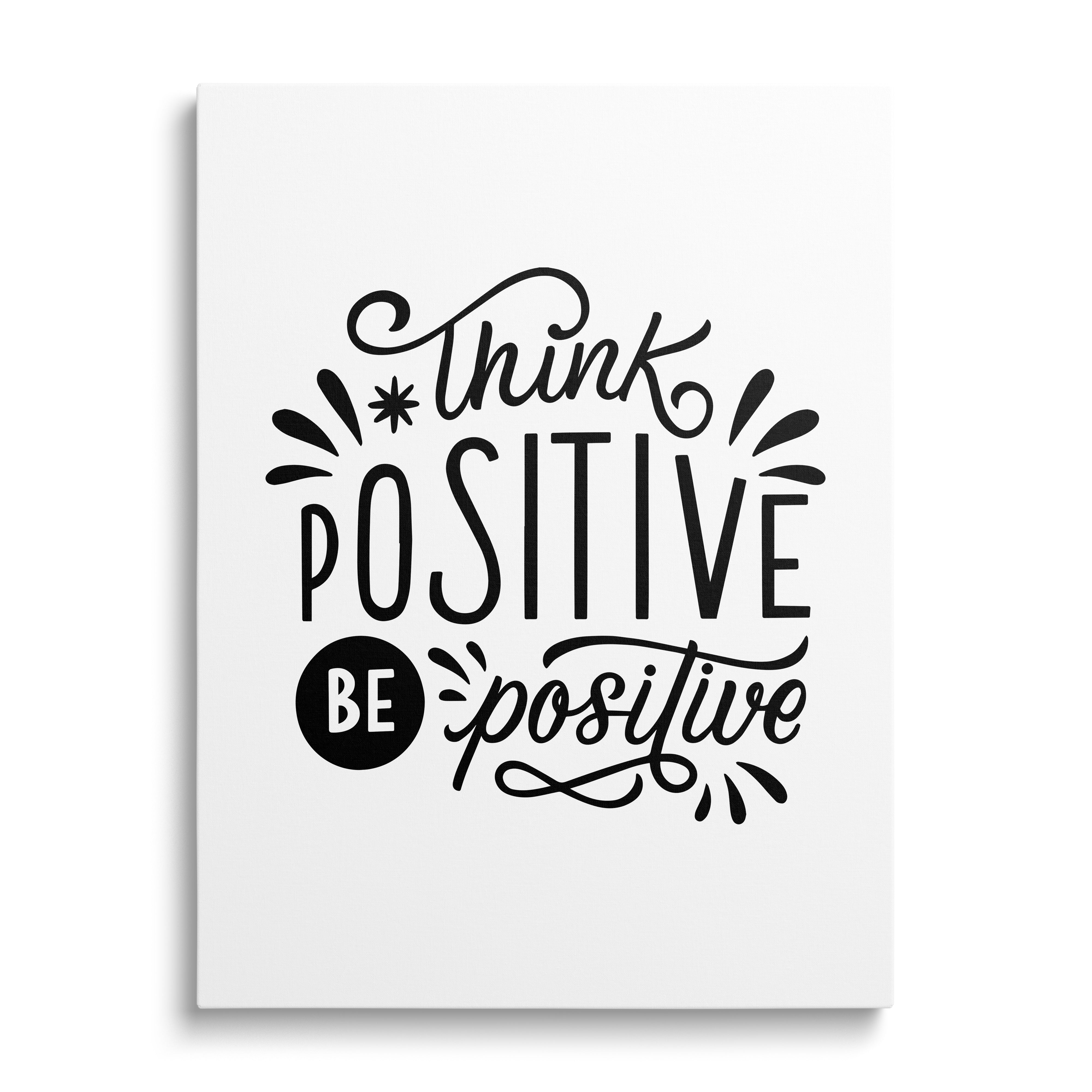 Motivational wall art with the black-and-white calligraphy quote “Think positive be positive”, front view