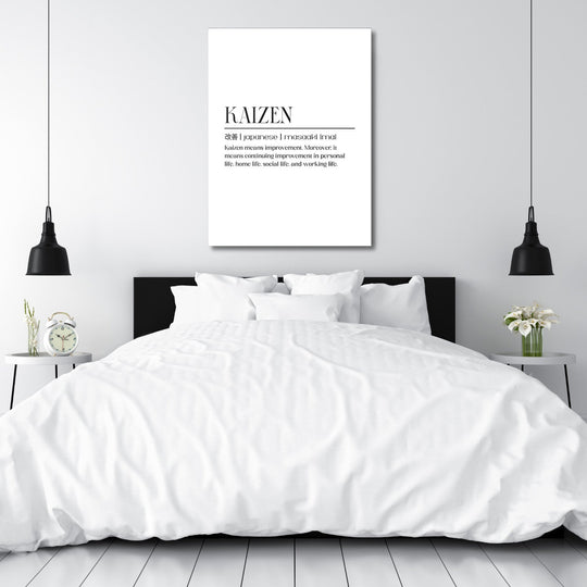 Kaizen motivational canvas print with a quote above the bed in a modern minimalist bedroom