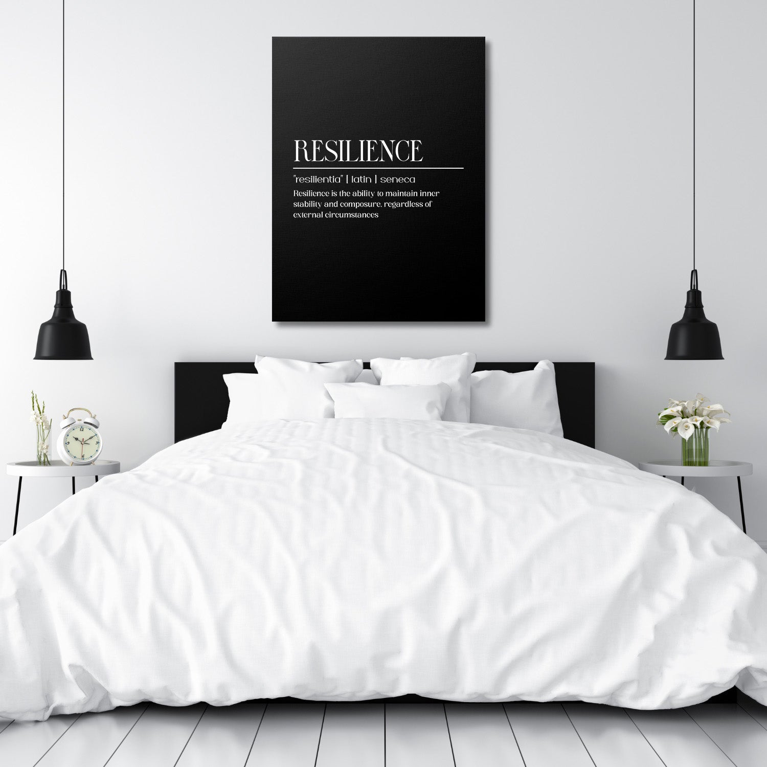 Motivational canvas print with a Resilience quote hanging above a white bed in a minimalist bedroom