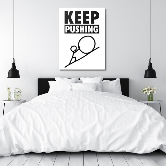 KEEP PUSHING minimalist motivational wall art above a bed in a white bedroom