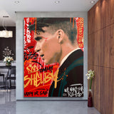 Motivational pop art wall art with a red street art portrait in a modern hallway