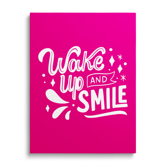 Motivational canvas print with the phrase “Wake up and smile” on a pink background in a minimalist style