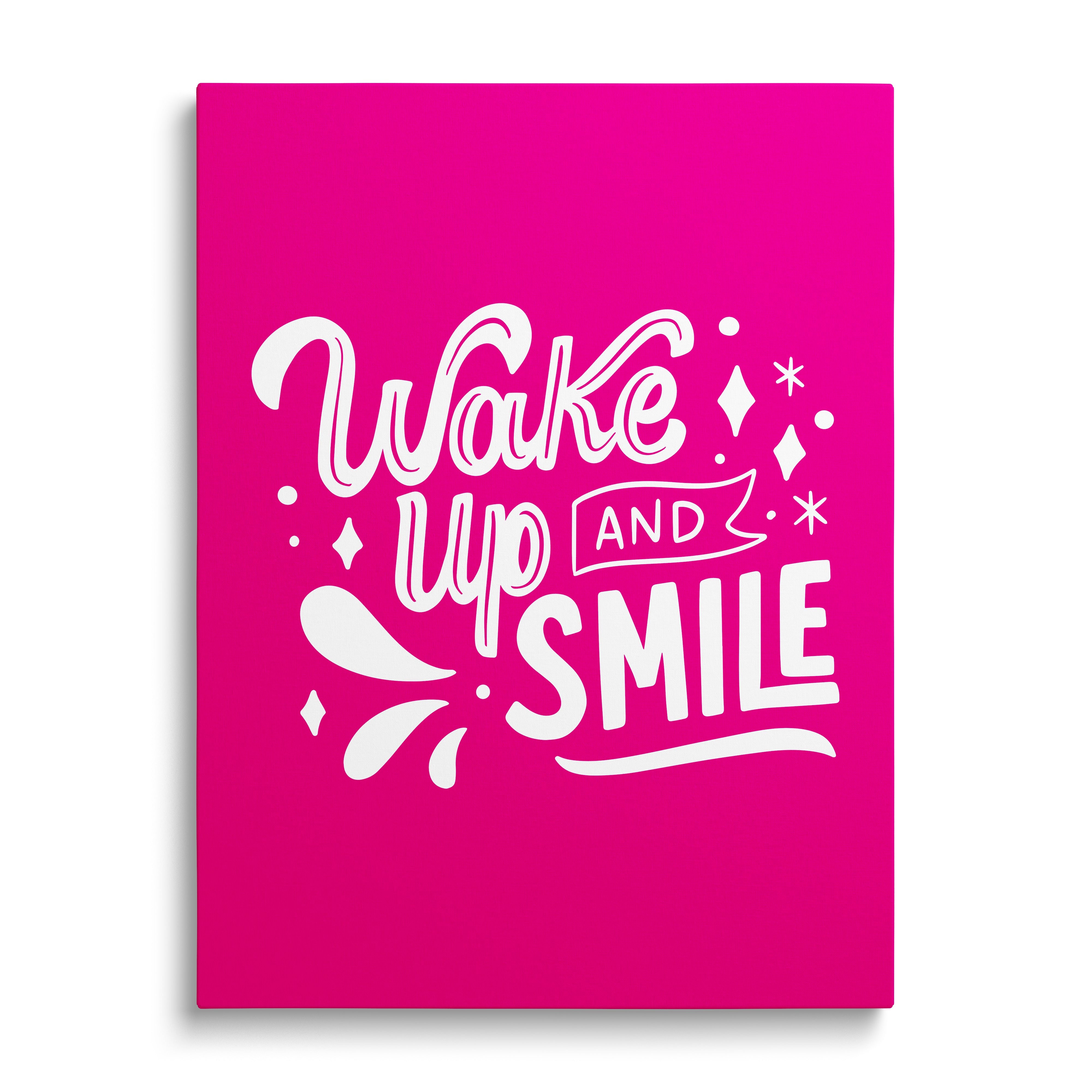 Motivational canvas print with the phrase “Wake up and smile” on a pink background in a minimalist style