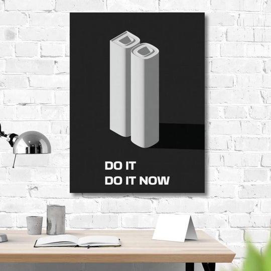 “Do It, Do It Now” motivational quote poster in a white office, motivational wall art and quote decor.