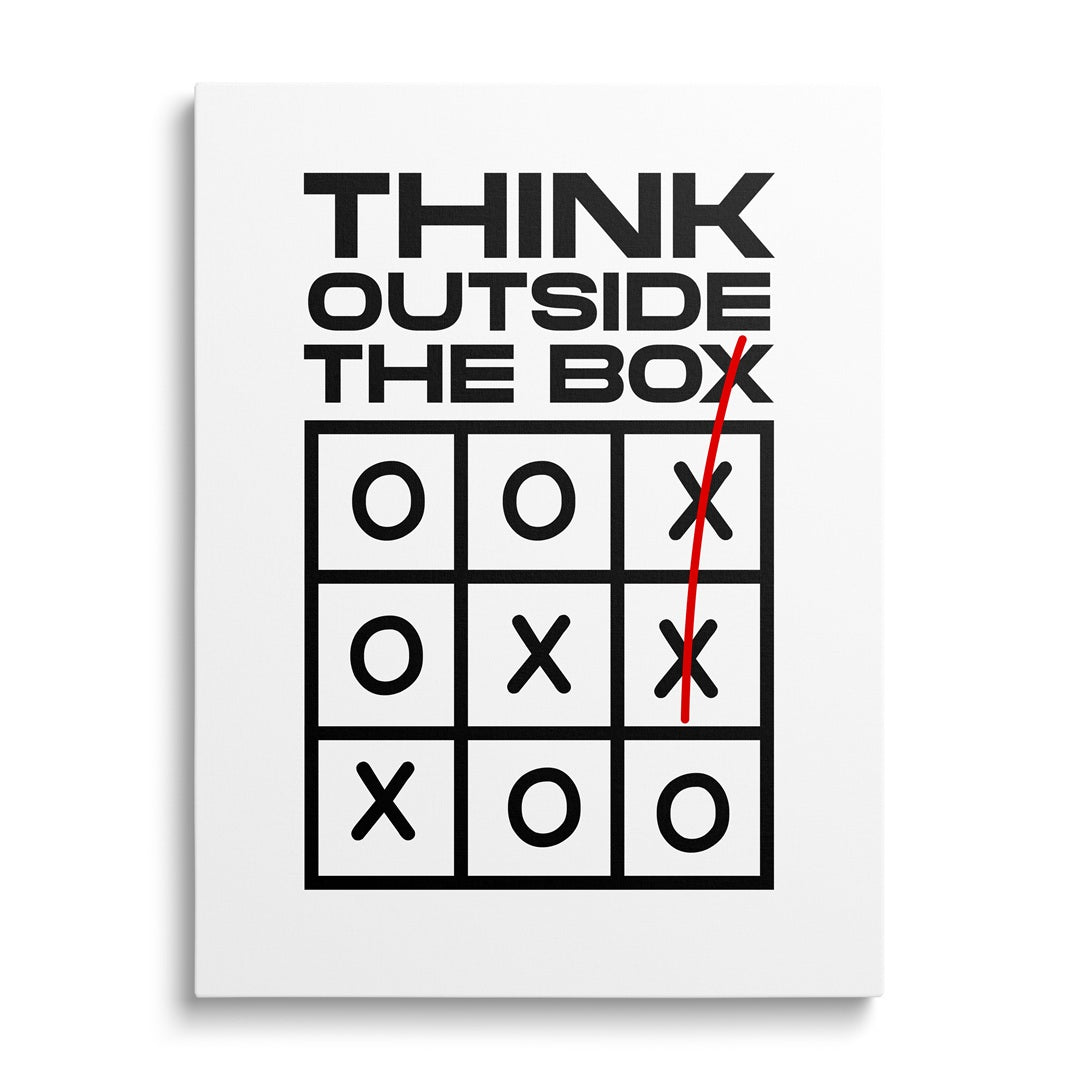 Motivational wall art with the quote “THINK OUTSIDE THE BOX.”