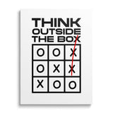 Motivational wall art with the quote “THINK OUTSIDE THE BOX.”