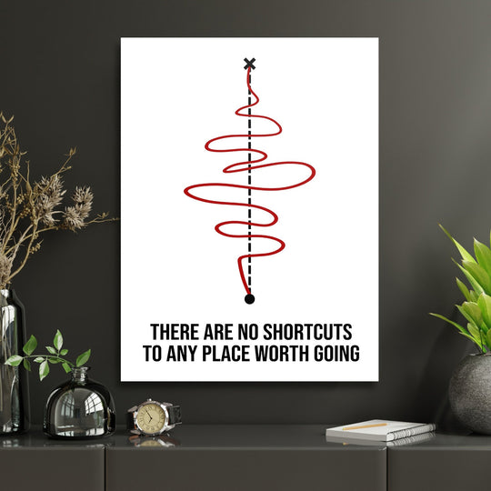 Motivational canvas print with a red curve and minimalist quote in a modern study